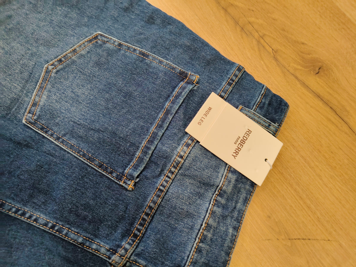 Pantalones vaqueros talla grande, tachuelas laterales