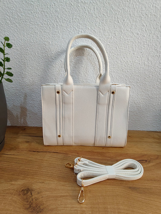 Bolsos blanco sintético.