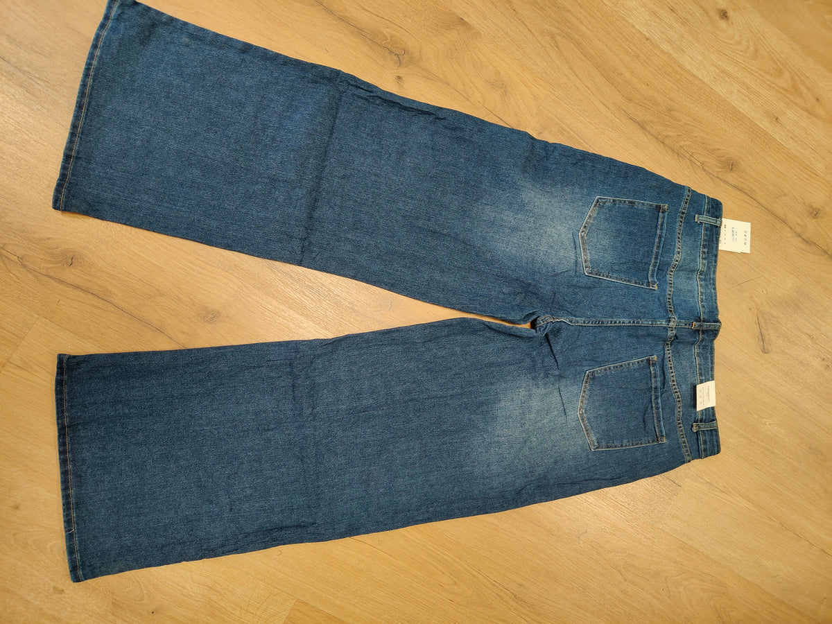 Pantalones vaqueros talla grande, tachuelas laterales
