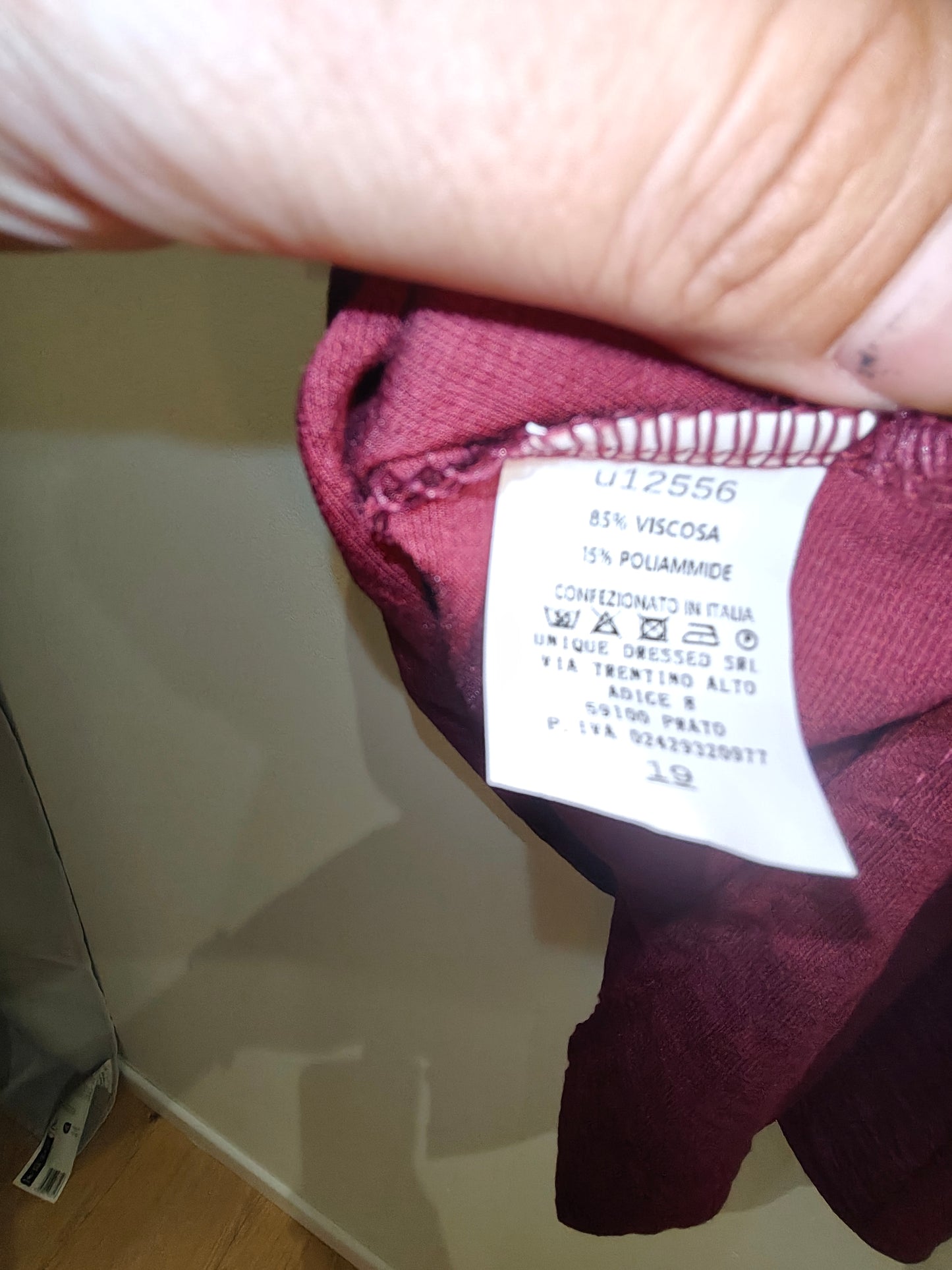 Camiseta ancha con botones en la espalda